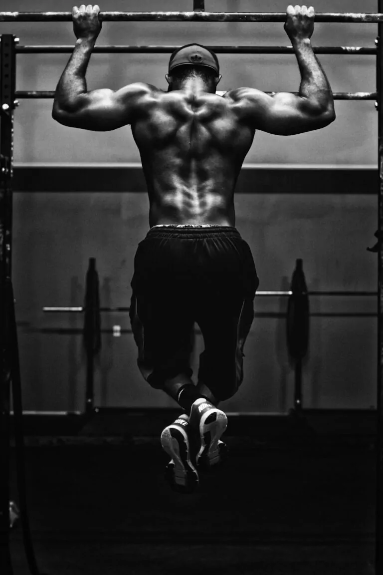 CrossFit athlete with lifting grips